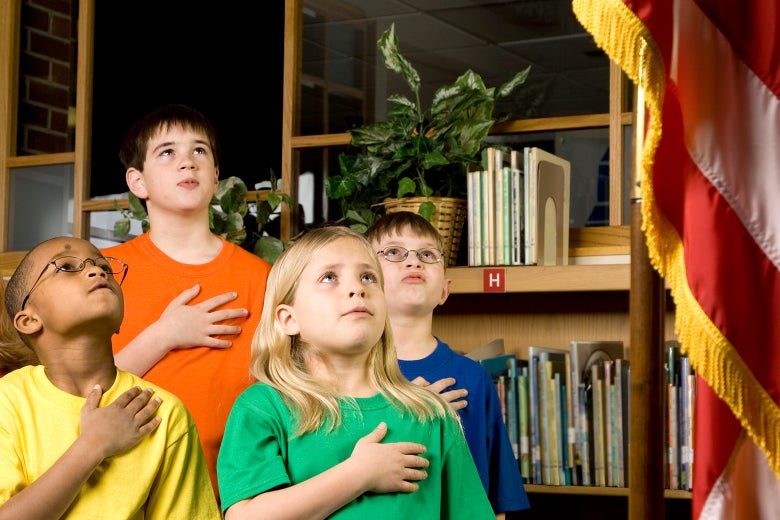 Children pledging allegiance to the United States flag
